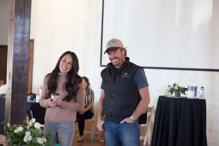 Chip and Joanna Gaines demonstrate their new paint products at the Phoenix Ballroom to...