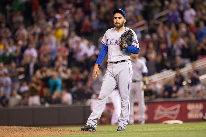 Texas Rangers relief pitcher Joakim Soria (28) looks on during the ninth inning against the...