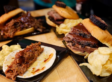 Zavala’s Barbecue’s brisket sandwich, right, Sloppy Juan tacos, left, and chopped brisket...