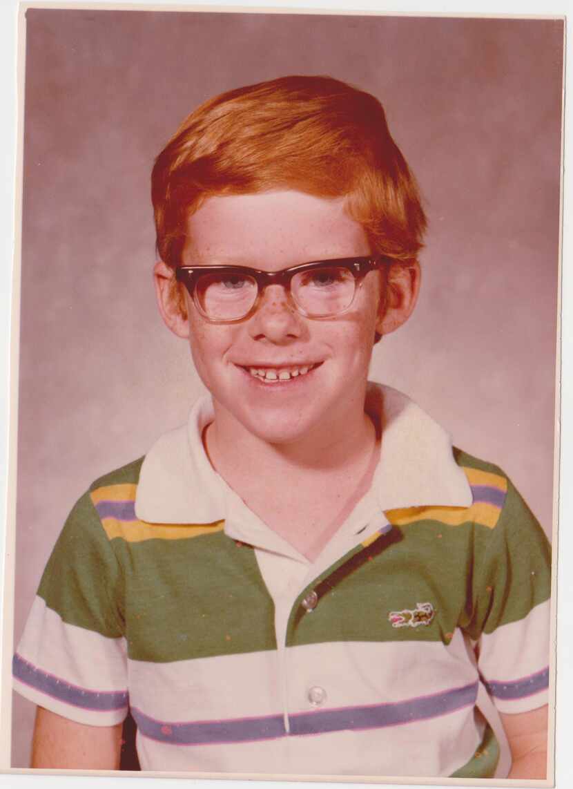 Matt Wixon, our high school sports columnist, wins the school-photo contest. Hair + glasses...