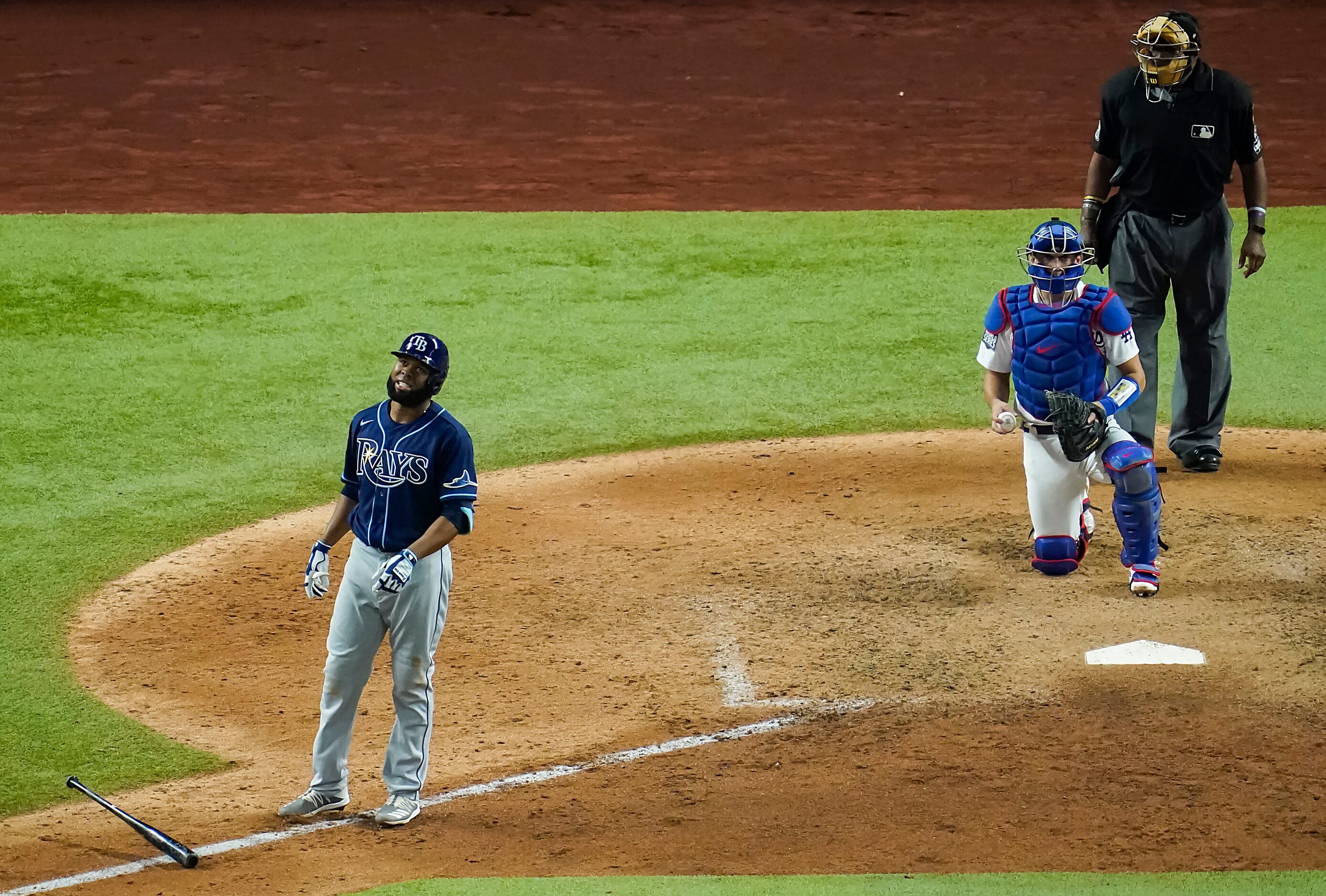 Tampa Bay Rays left fielder Manuel Margot reacts after bing called out on strikes during the...