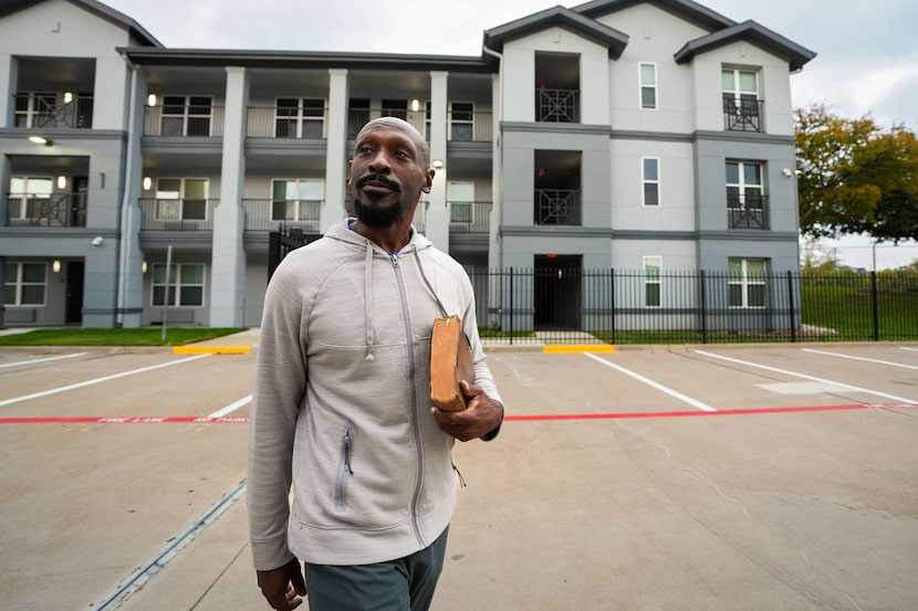 Anthony Armstrong, 44, walks between buildings at St. Jude Center Vantage Point, where he...