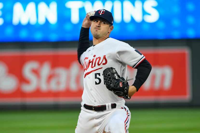 Minnesota Twins pitcher Tyler Mahle throws against the Washington Nationals during the third...