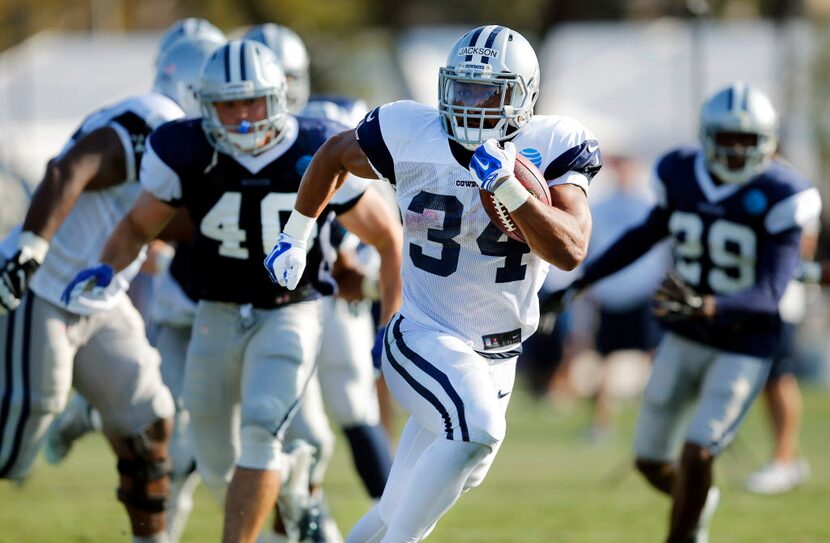 Dallas Cowboys running back Darius Jackson (34) carries the ball during afternoon practice...