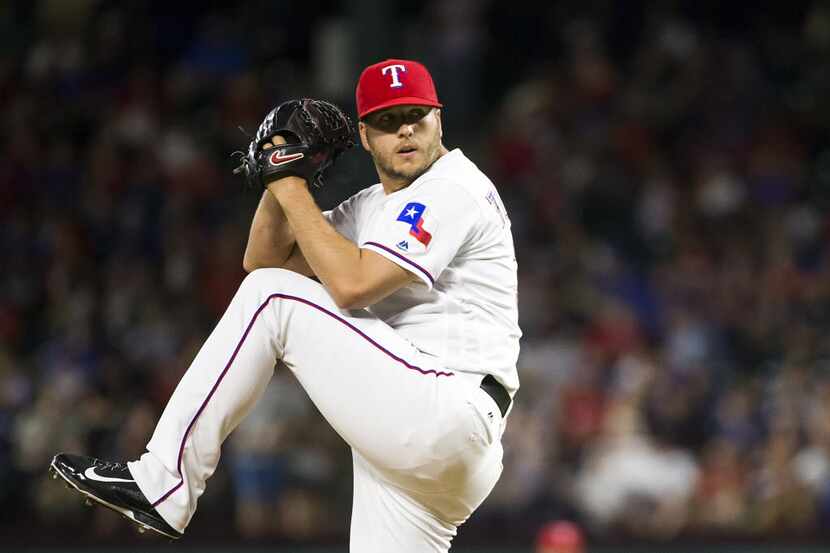 Texas Rangers relief pitcher Shawn Tolleson pitches during the ninth inning against the New...