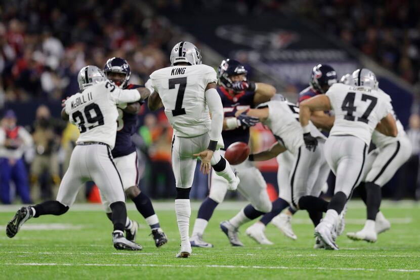 FILE - Raiders punter Marquette King (7) punts the ball during the second half of an AFC...
