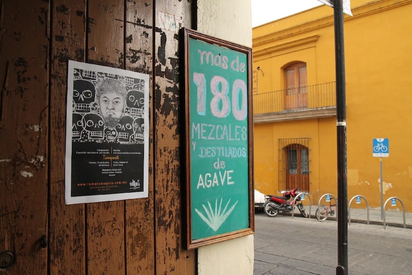 A sign welcomes drinkers outside of In Situ.