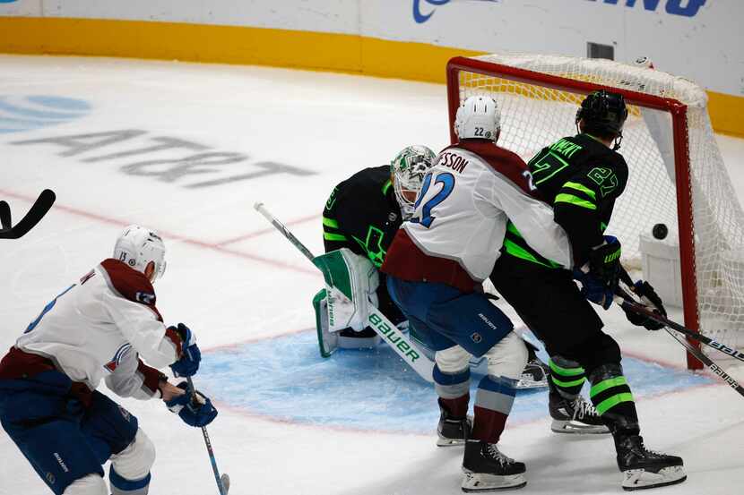 Colorado Avalanche right wing Valeri Nichushkin (13), far left, scores a goal against Dallas...