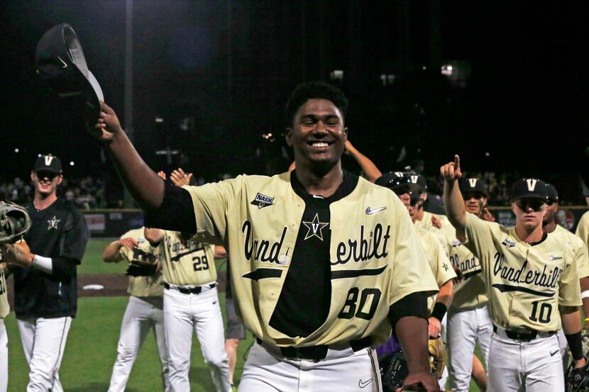 Vanderbilt's Kumar Rocker (80) tips his hat to fans after the team's NCAA college baseball...