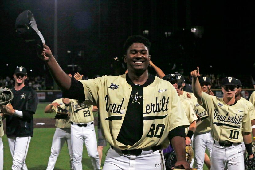 FILE - Vanderbilt pitcher Kumar Rocker (80) tips his hat to fans after throwing a no-hitter...