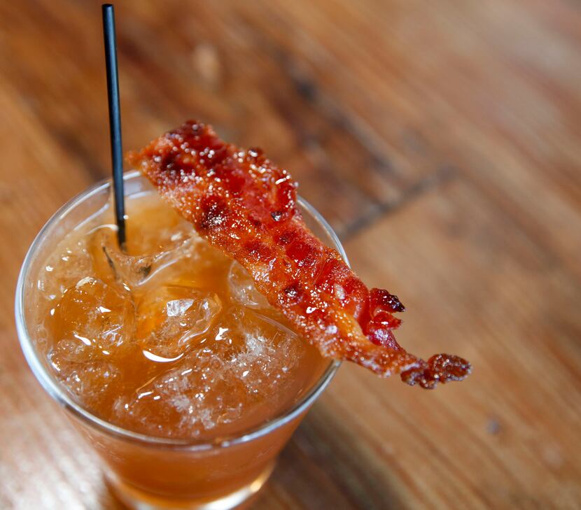 Barn Light Cocktail with Jack Daniels, maple syrup and a piece of bacon at the Barn Light...
