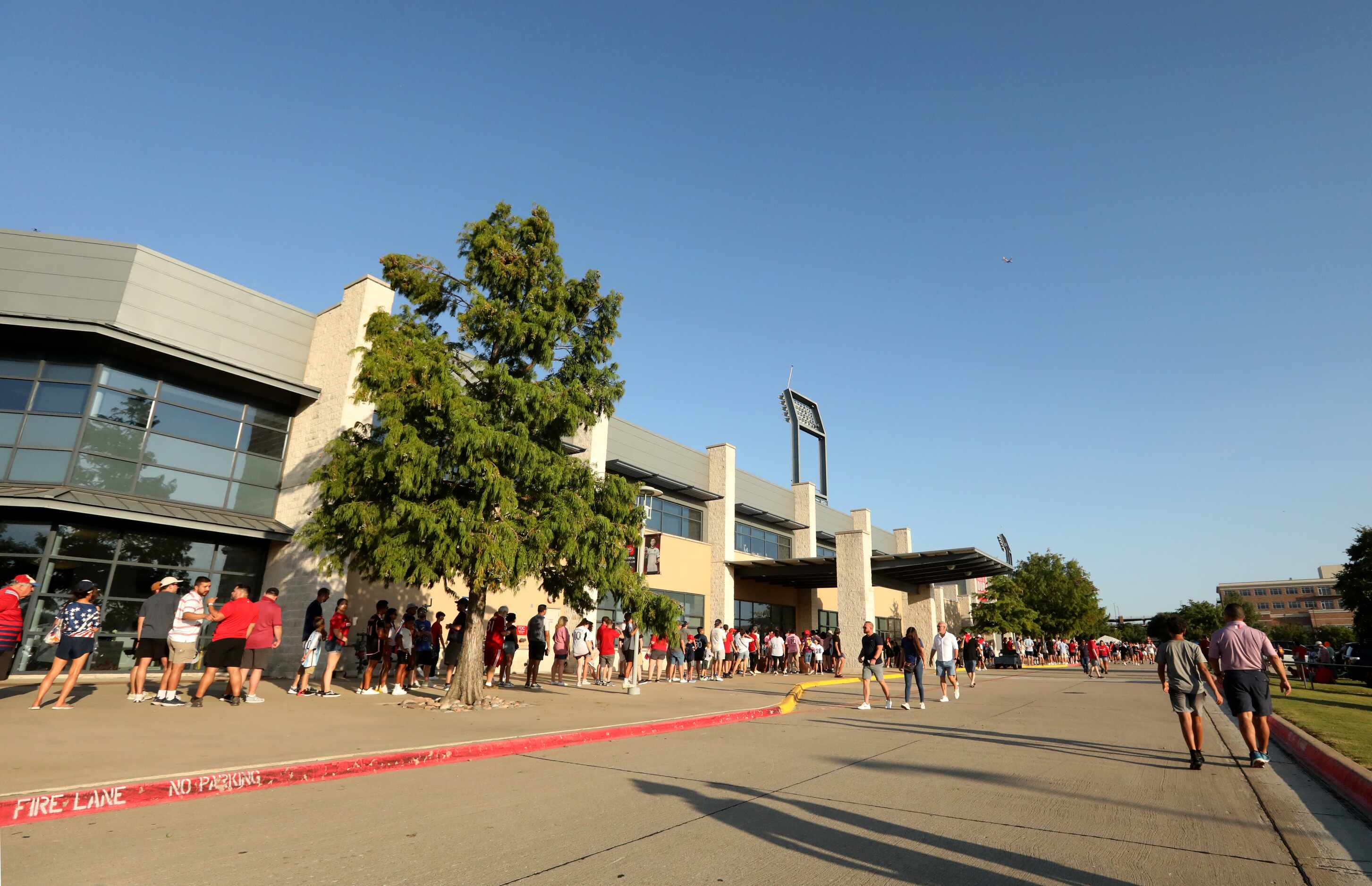 Fans wait for the gates to open for an FC Dallas game at Toyota Stadium in Frisco, TX, on...