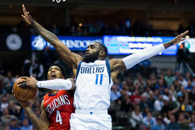 Dallas Mavericks guard Tim Hardaway Jr. (11) defends against New Orleans Pelicans guard...