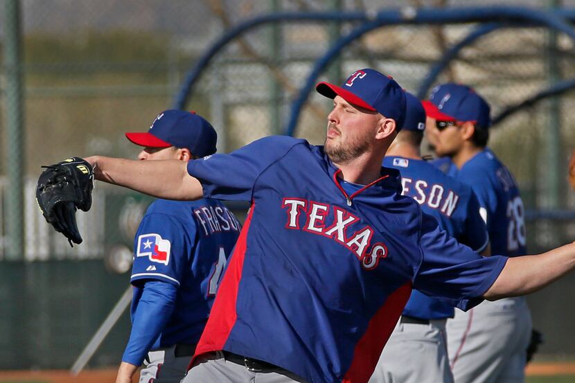Texas pitcher Matt Harrison is pictured during morning practice during Texas Rangers...