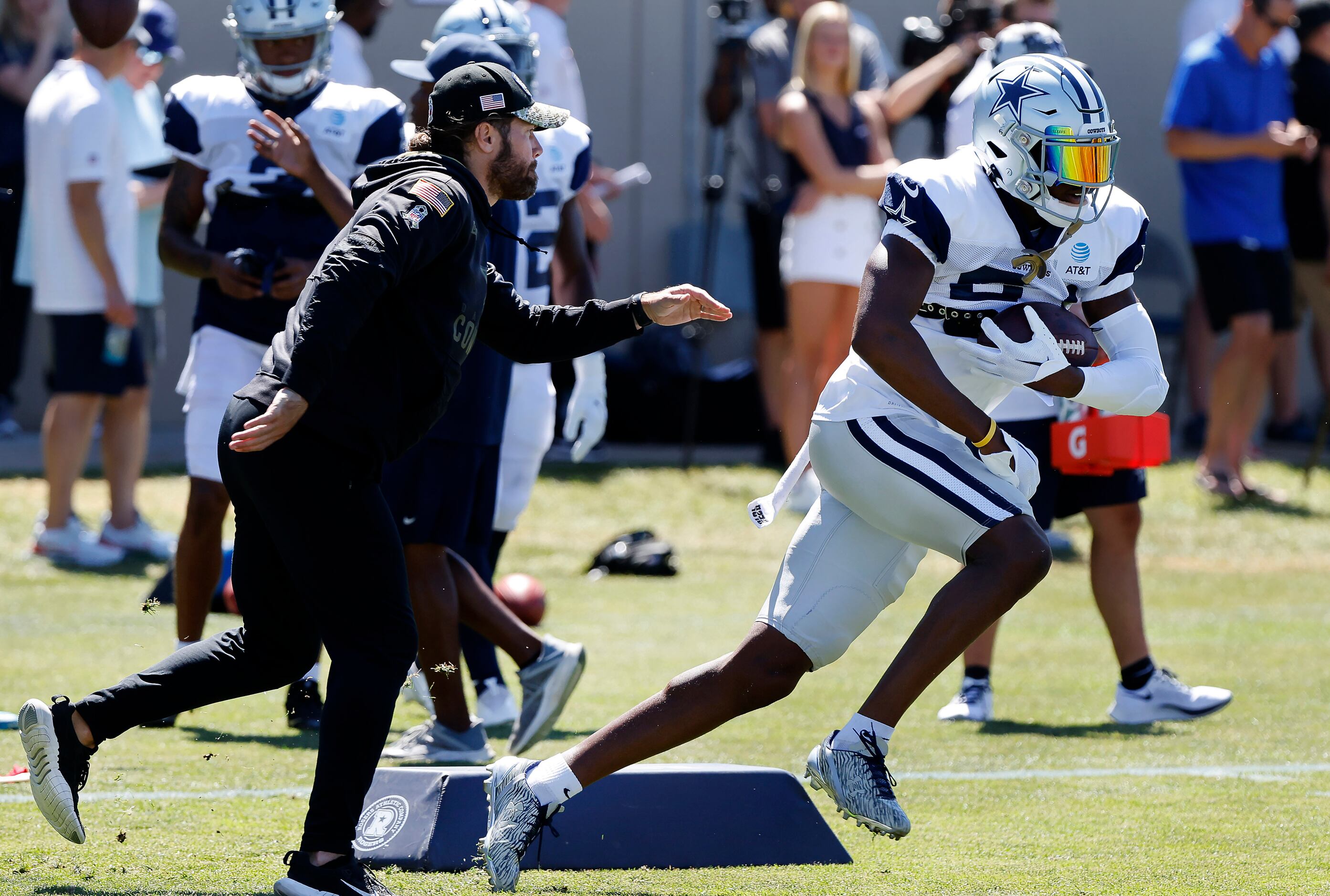 Dallas Cowboys safety Israel Mukuamu (24) runs through drill prior to a joint practice with...