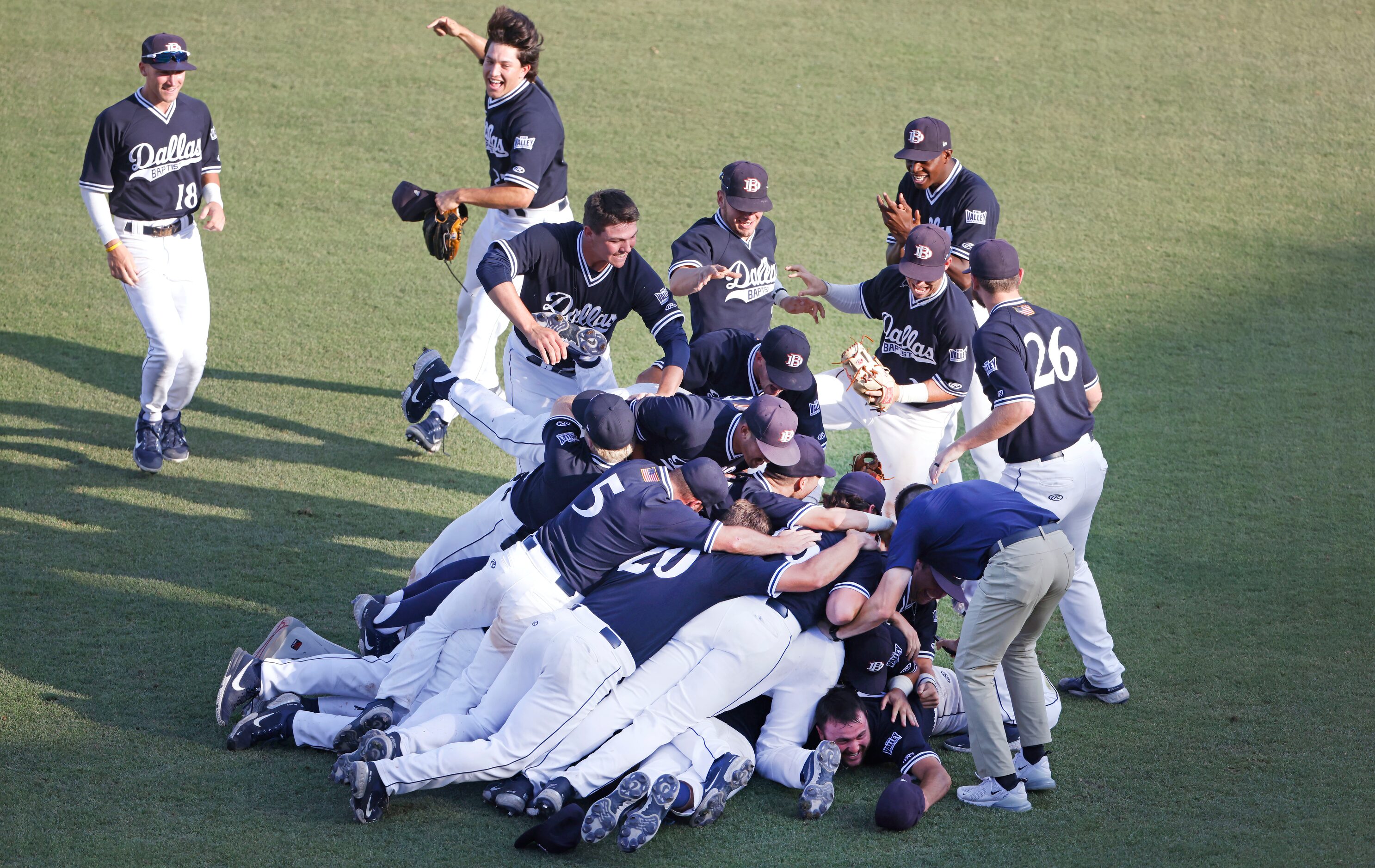 Dallas Baptist celebrates their 8-5 win over Oregon St. following the NCAA Division I...