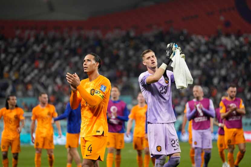 Virgil van Dijk, left, and goalkeeper Andries Noppert of the Netherlands celebrate at end of...