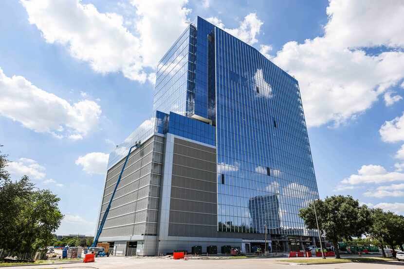 Reata Tower is under construction at Communications Parkway on Plano.