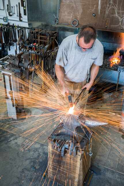 Metal artist Zack Noble works in the River Arts District of Asheville, N.C. 