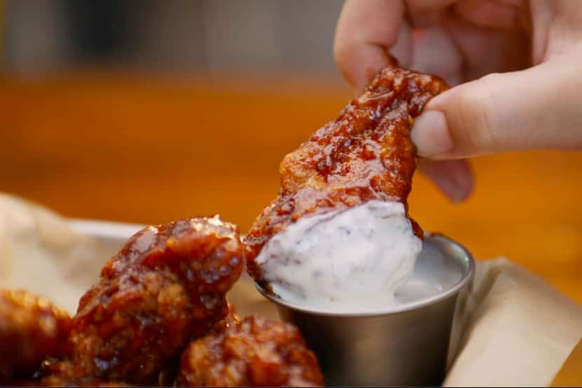 Hoots Wings, a Hooters offshoot, sells a menu of wings, buffalo shrimp and loaded tots in a...