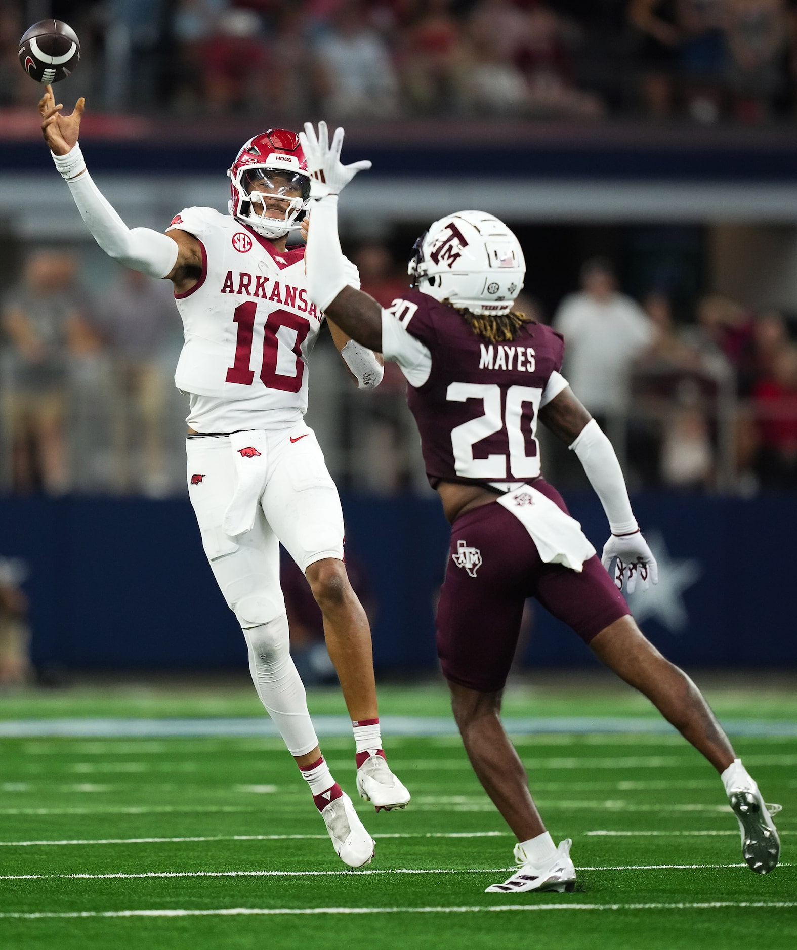 Arkansas quarterback Taylen Green (10) throws a pass over Texas A&M defensive back BJ Mayes...