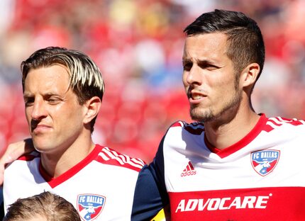 FC Dallas defenders Reto Ziegler (3), left, and Matt Hedges (24) pose as part a group photo...