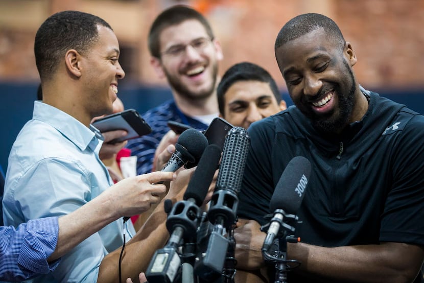 Dallas Mavericks guard Raymond Felton laughs with reporters as the team conducts exit...