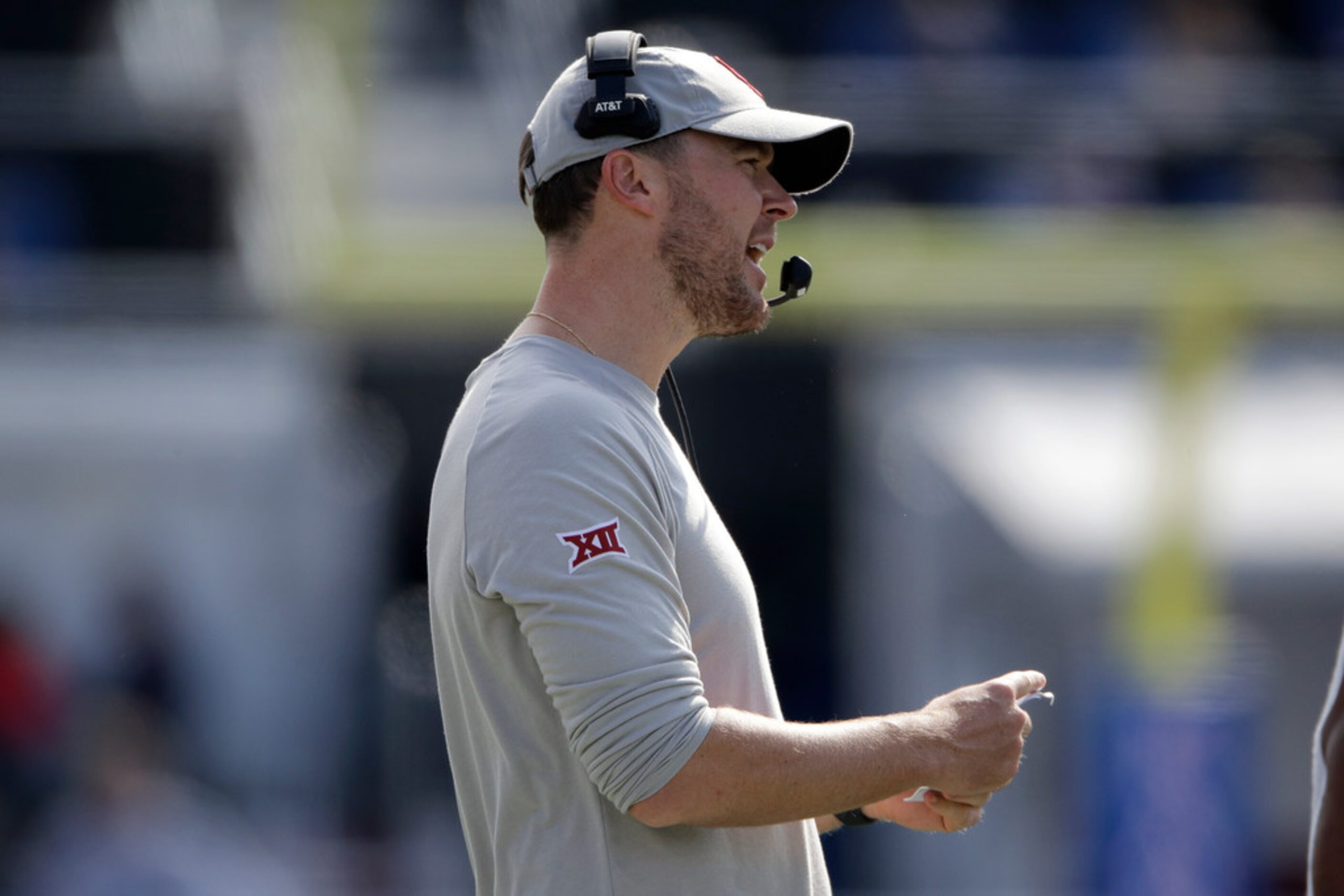 Oklahoma head coach Lincoln Riley talks to his players during the second half of an NCAA...