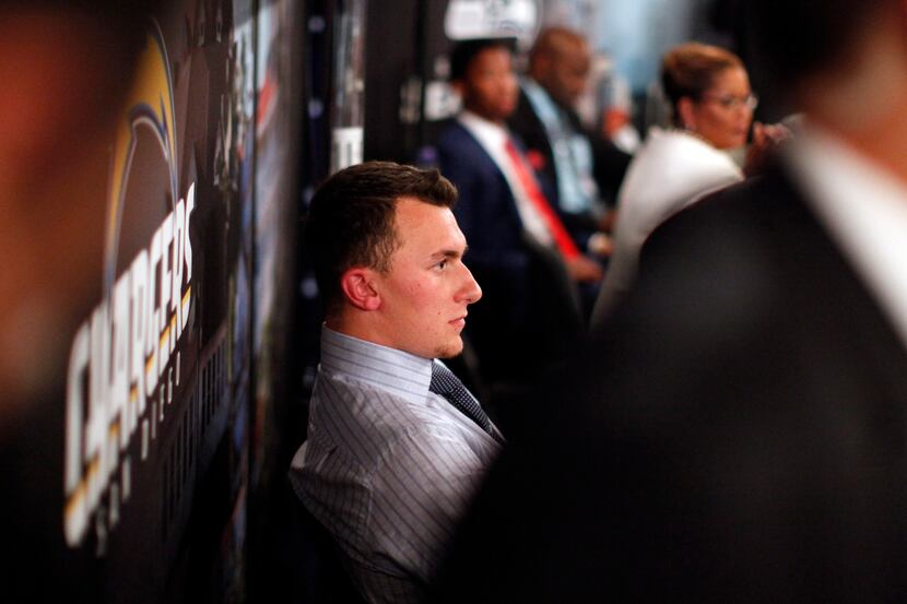 Johnny Manziel, from Texas A&M, waits backstage during the first round of the NFL football...