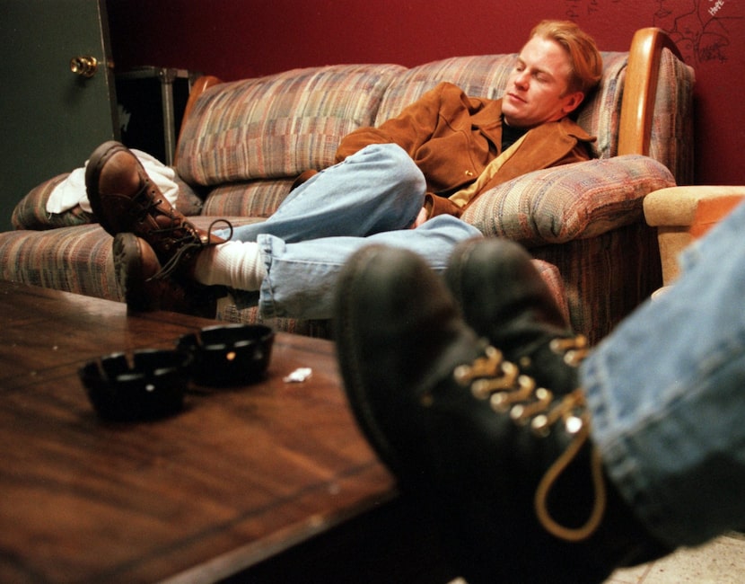 Todd Pipes, lead singer for Deep Blue Something, waits backstage to perform at the Varsity...