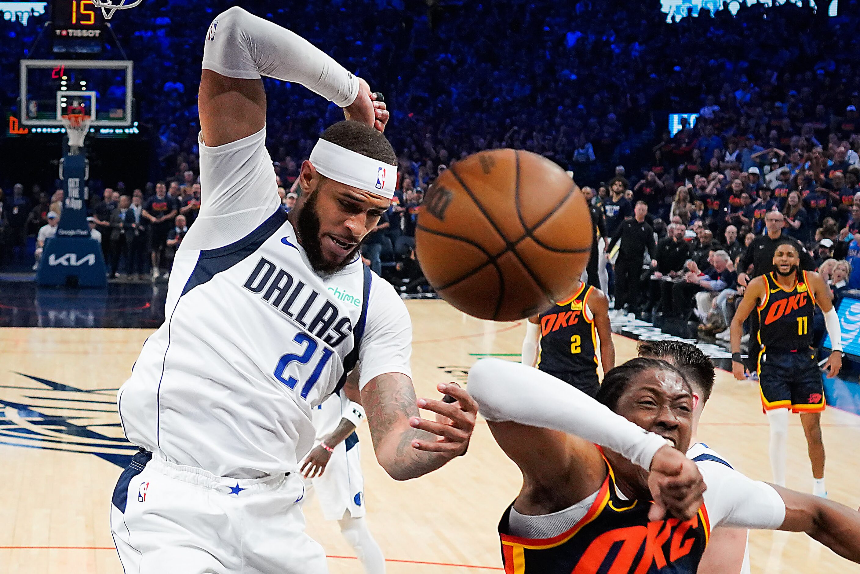 Oklahoma City Thunder forward Jalen Williams (8) celebrates after he dunked past Dallas...