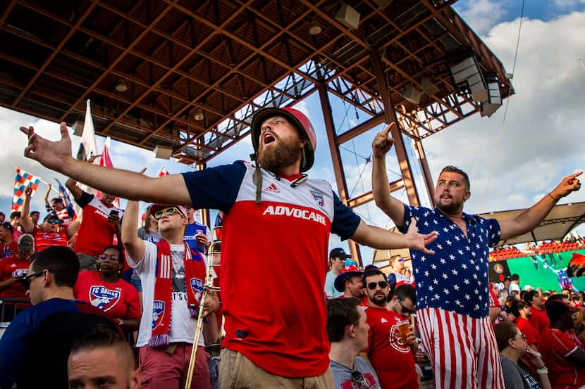 FC Dallas supporters cheer their team before a game against Atlanta United.