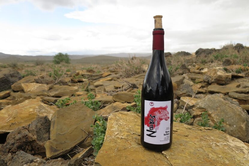 Neuras wine with the lodge's large animal reserve in the background. 