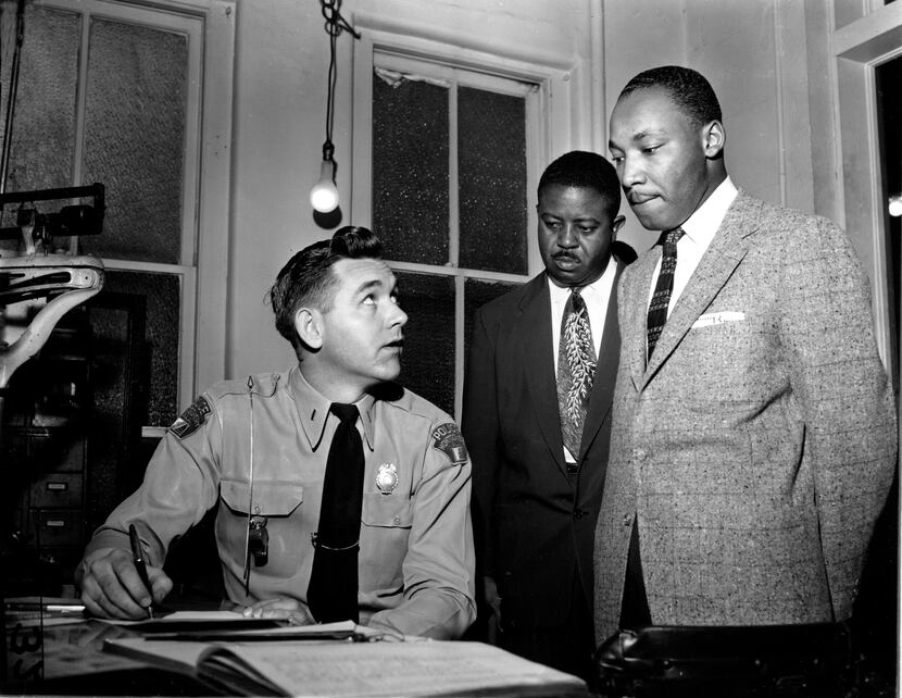 The Rev. Martin Luther King Jr. (right), accompanied by the Rev. Ralph D. Abernathy, is...