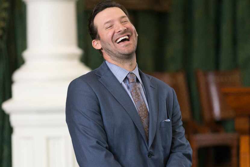 Former Dallas Cowboys quarterback Tony Romo smiles as he is recognized by the Senate at the...
