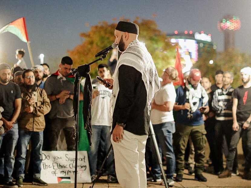 Imam Omar Suleiman addresses the crowd at a Wednesday night vigil for Palestinian children...