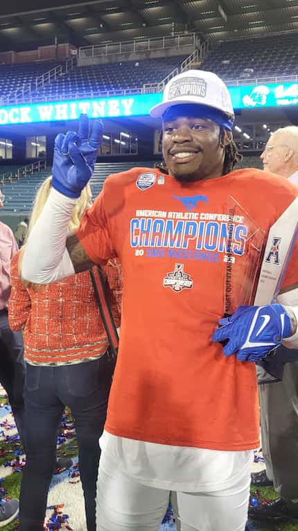 SMU safety Isaiah Nwokobia poses with the American Athletic Conference Championship Game MVP...