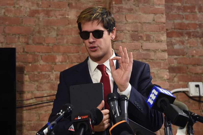 Milo Yiannopoulos speaks at a press conference in February, announcing his resignation...