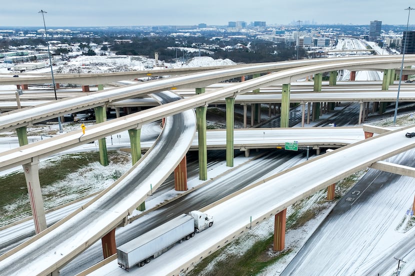 An icy mix covered the High Five Interchange at U.S. Highway 75 and Interstate 635 on...