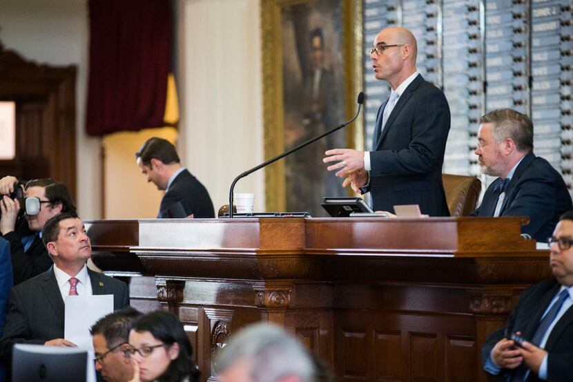Speaker of the House Dennis Bonnen presides as members debate HB3, a school finance bill, on...