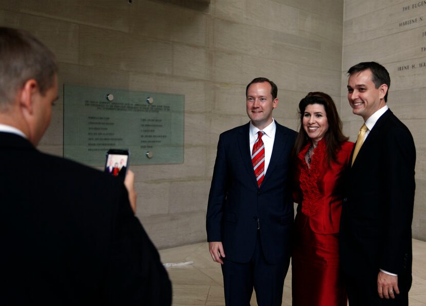 Newly sworn-in Dallas City Council members Philip Kingston (left), District 14, and Scott...