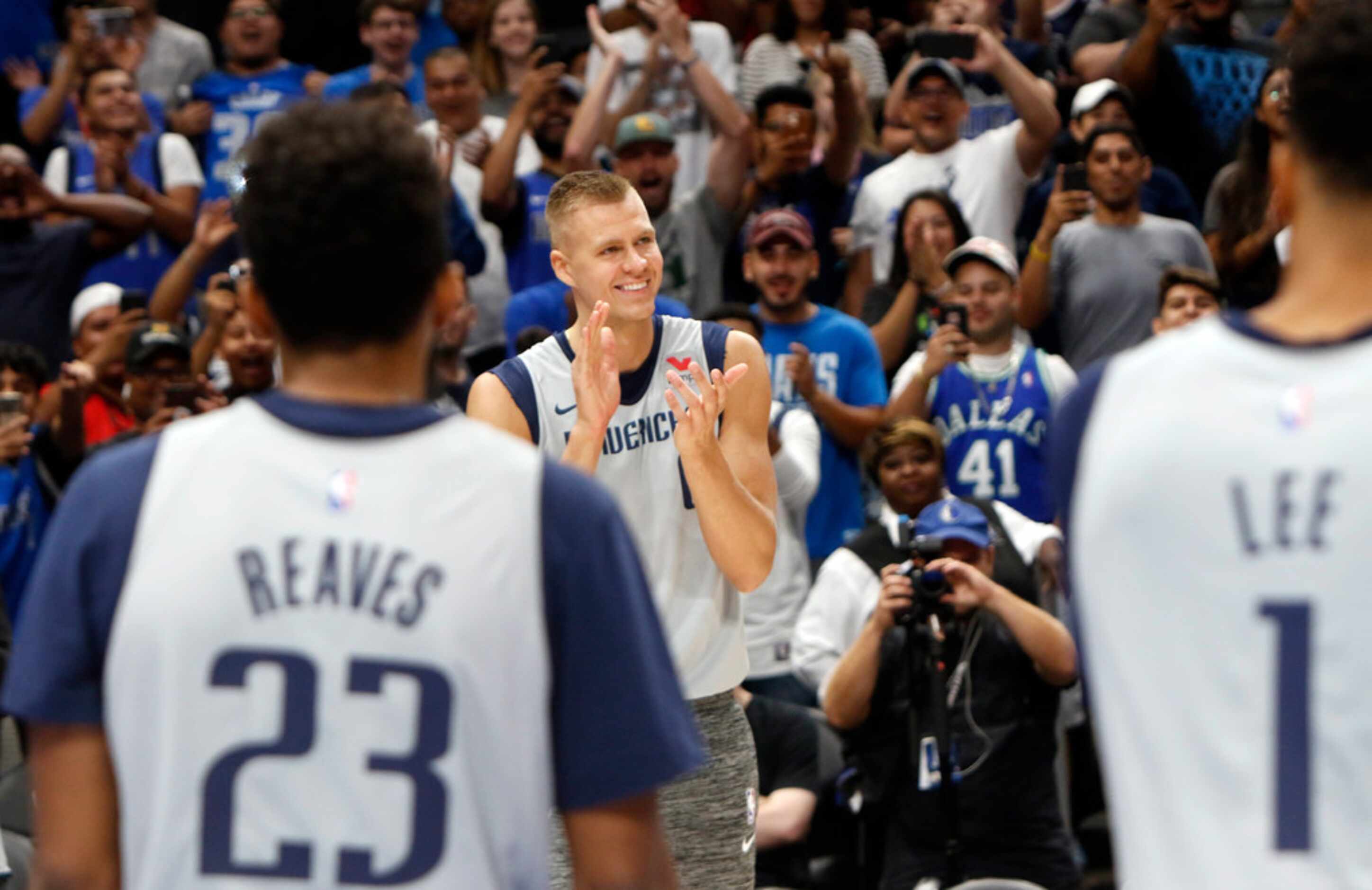 It was difficult to determine whether Kristaps Porzingis (6) was more excited or Mavericks...