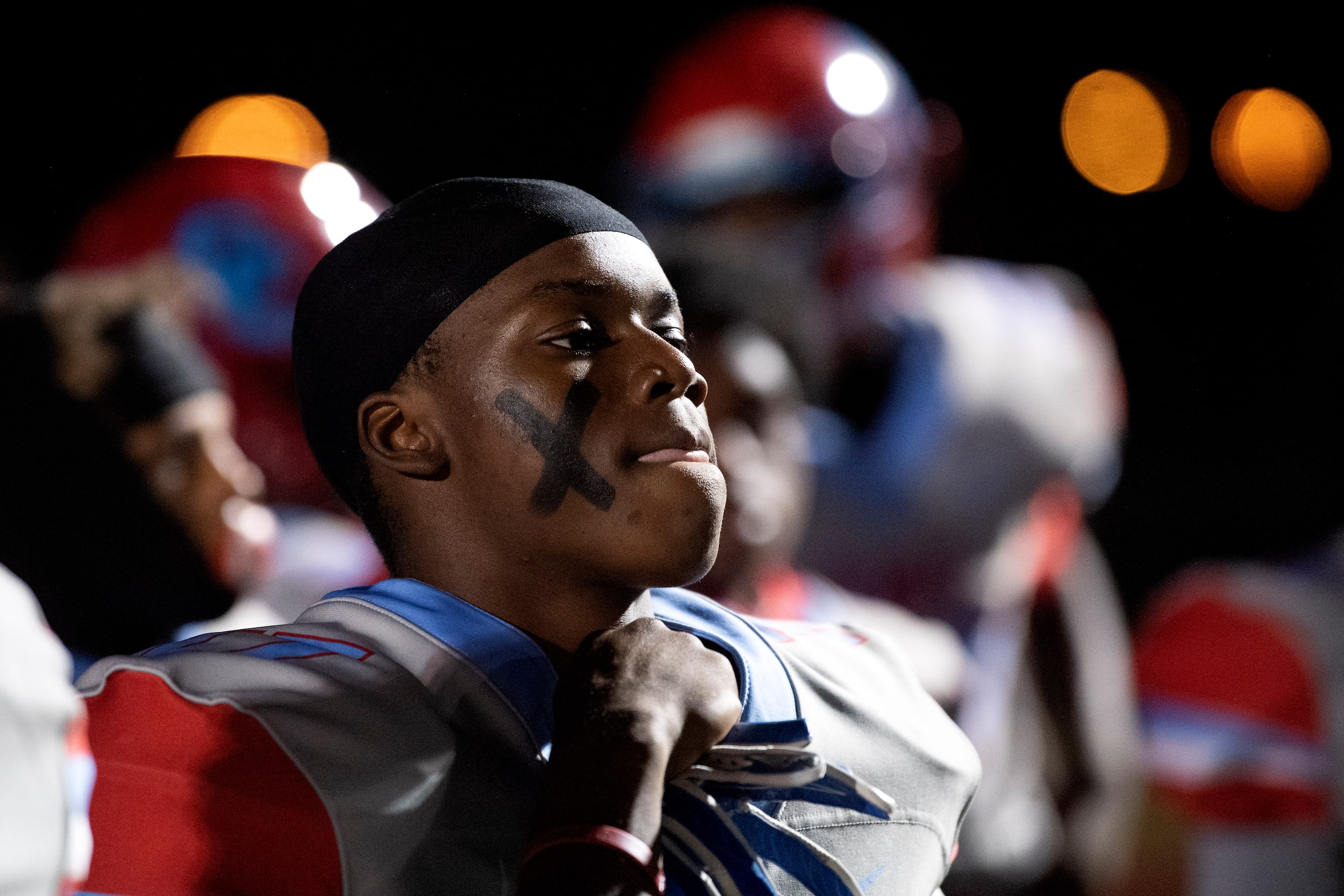 Carter senior defensive back Jordan Walker puts his game face on before a high school...