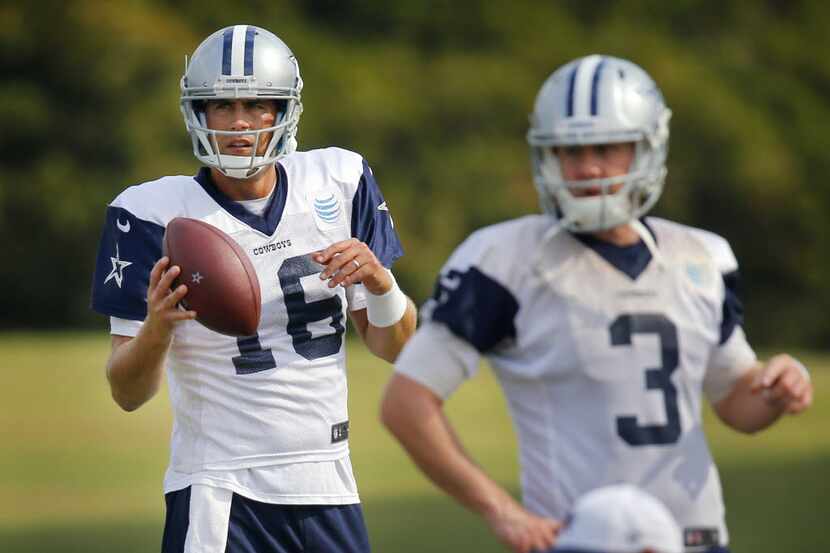 Dallas Cowboys quarterbacks Matt Cassel (16) and Brandon Weeden (3) warm up during practice...