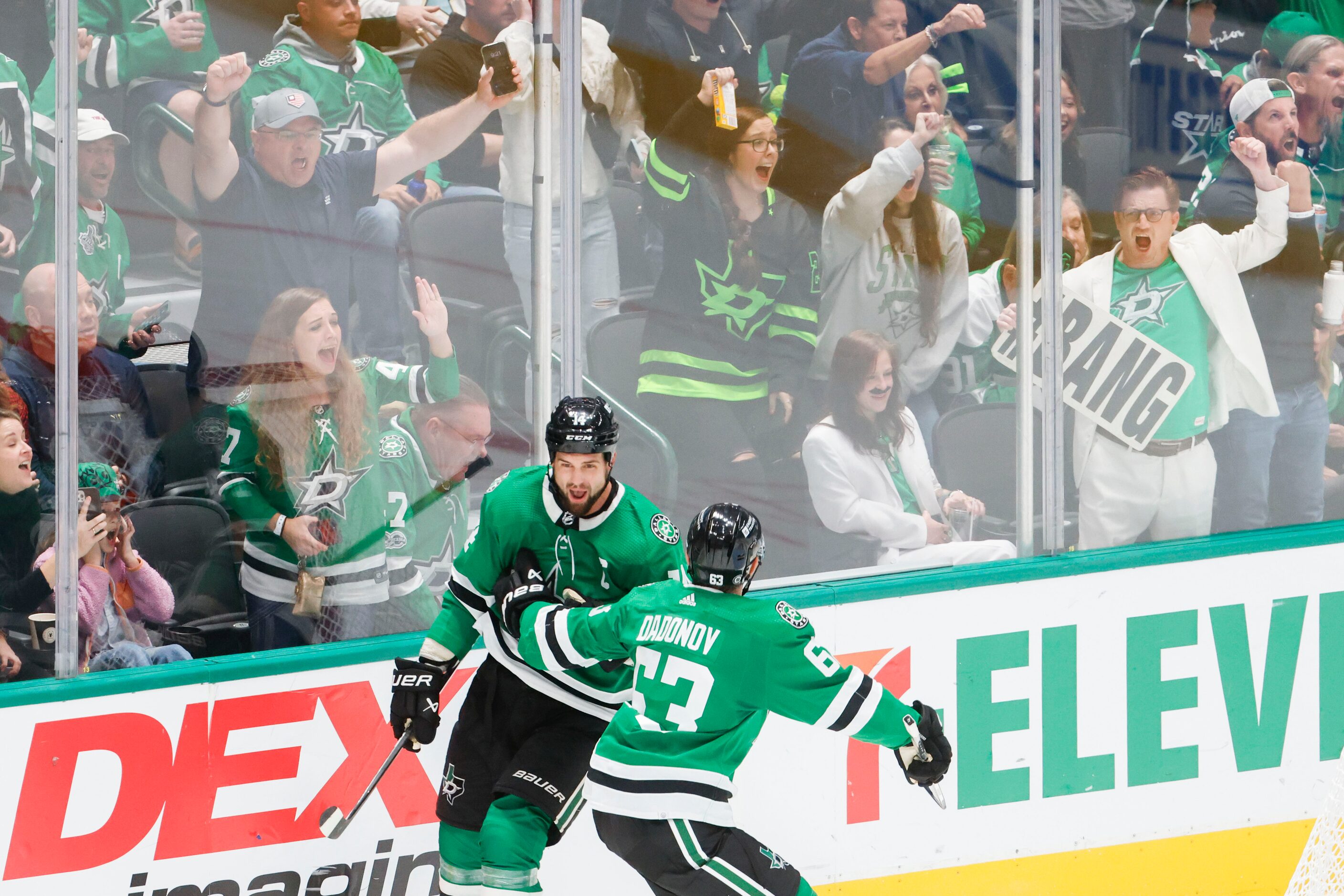 Dallas Stars left wing Jamie Benn (left) celebrates a goal with right wing Evgenii Dadonov...