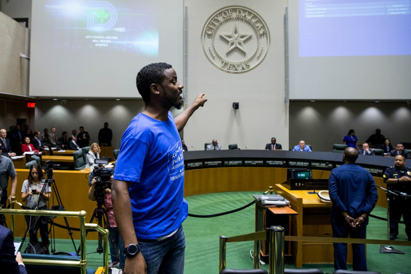 Activist Dominique Alexander, leading a protest at a Dallas City Council meeting in...