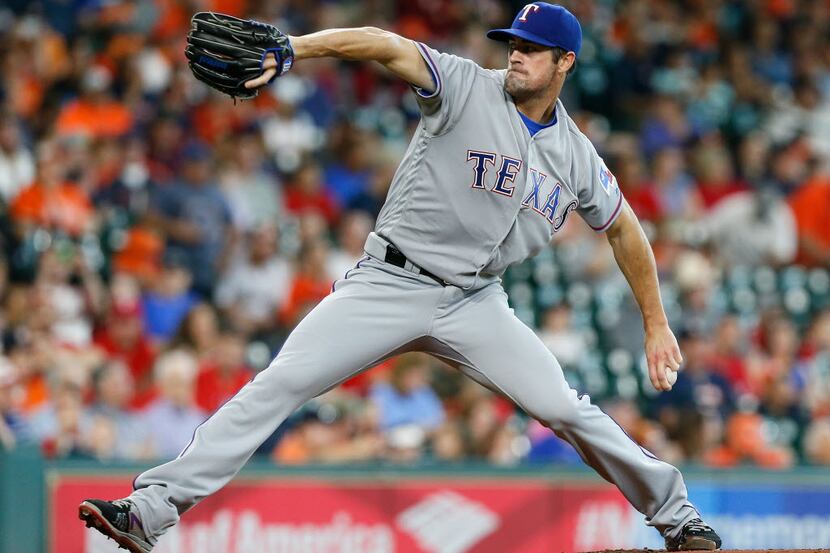 HOUSTON, TX - MAY 22:  Cole Hamels #35 of the Texas Rangers pitches in the first inning...