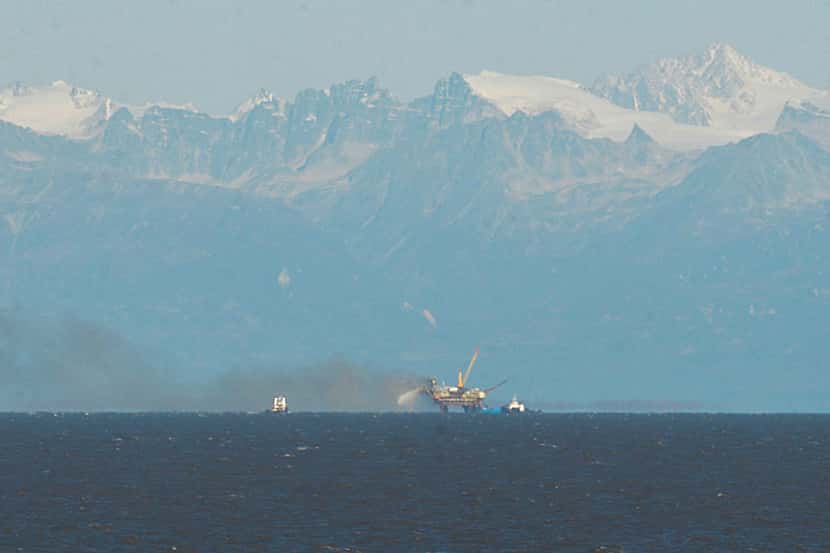 In 2014, a Hilcorp drilling platform in Cook Inlet caught fire eight miles off shore. (AP...