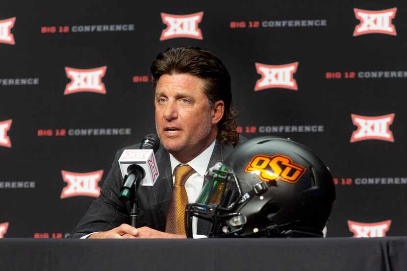 Oklahoma State University head football coach Mike Gundy speaks during the Big 12 Conference...