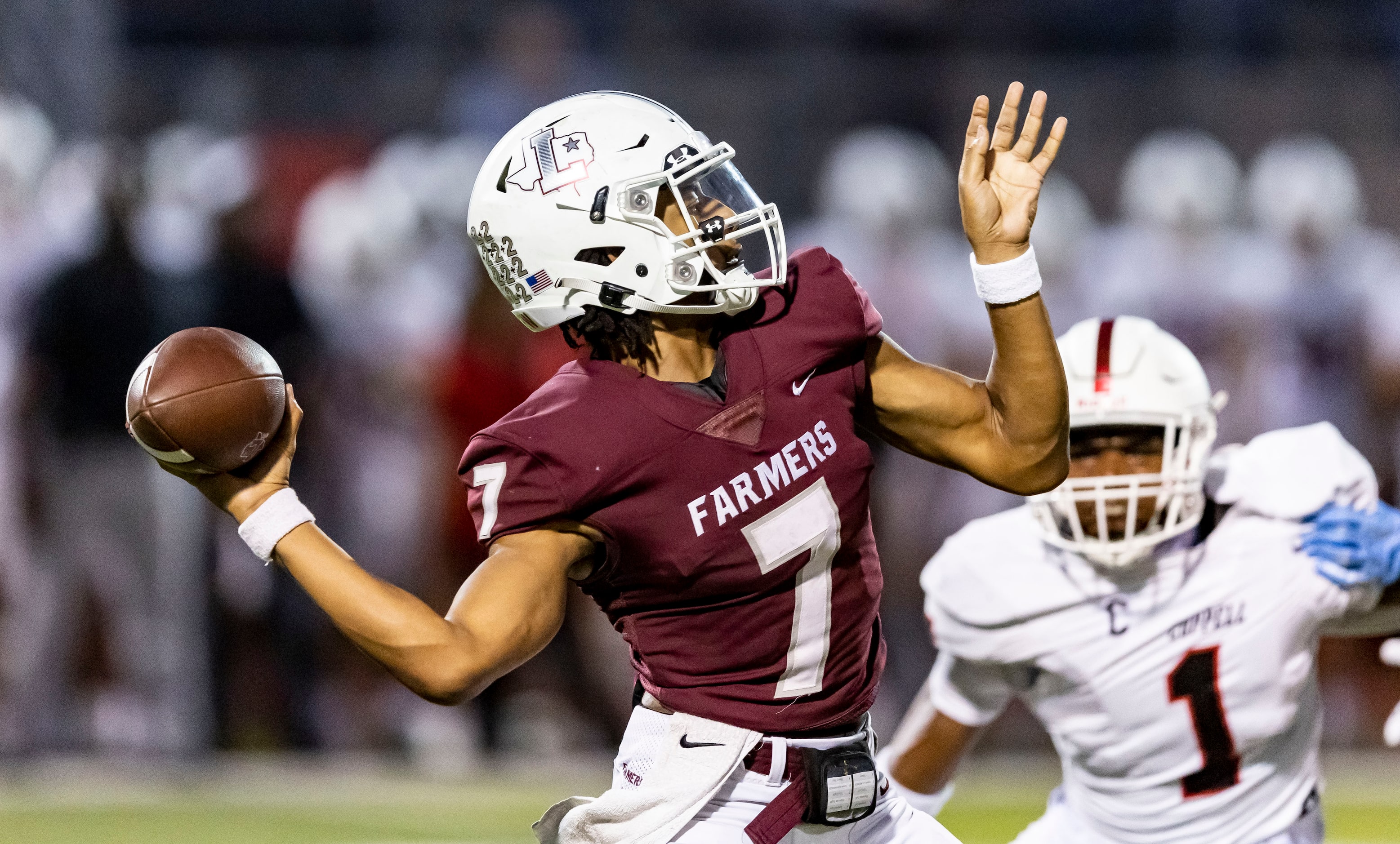 Lewisville junior quarterback Ethan Terrell (7) throws during the first half of a high...